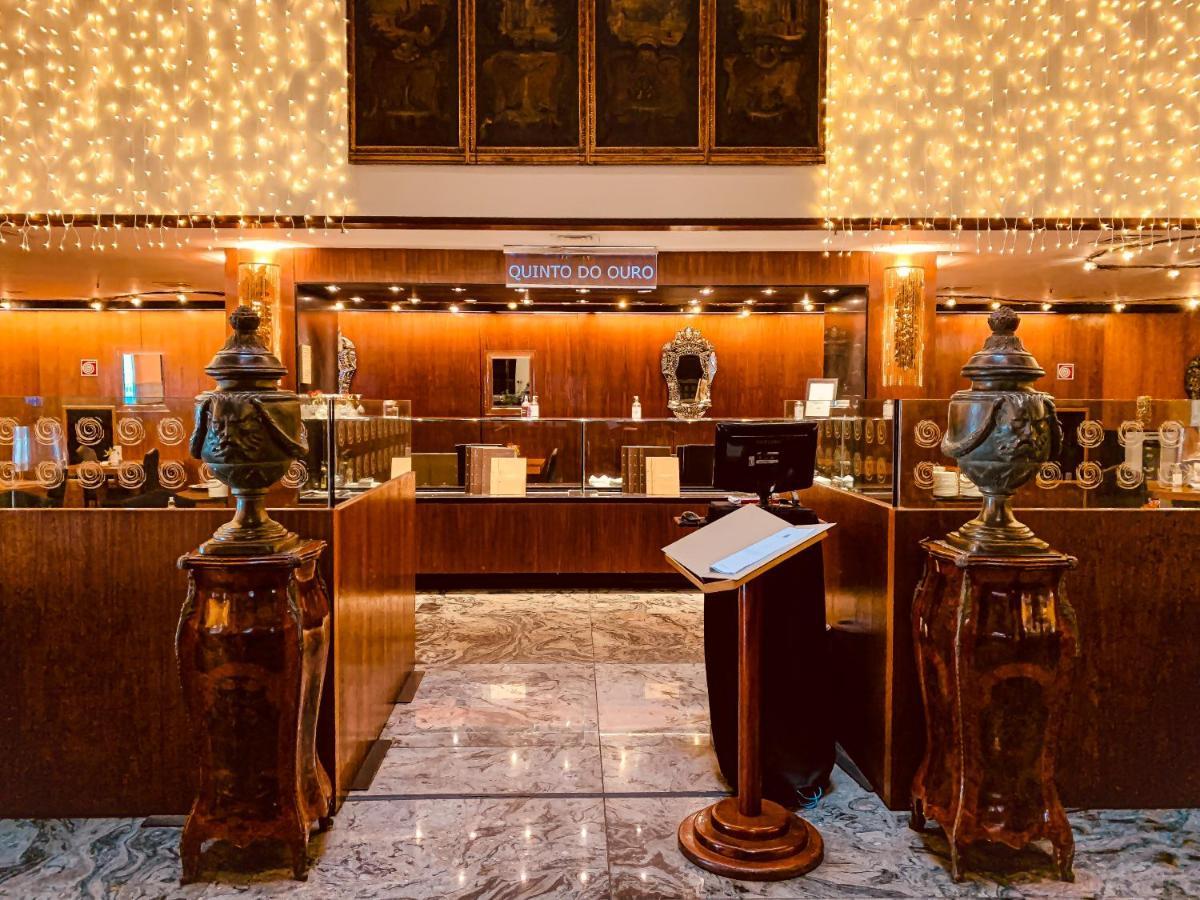 Ouro Minas Hotel Belo Horizonte, Dolce By Wyndham Exteriér fotografie The reception desk at the hotel