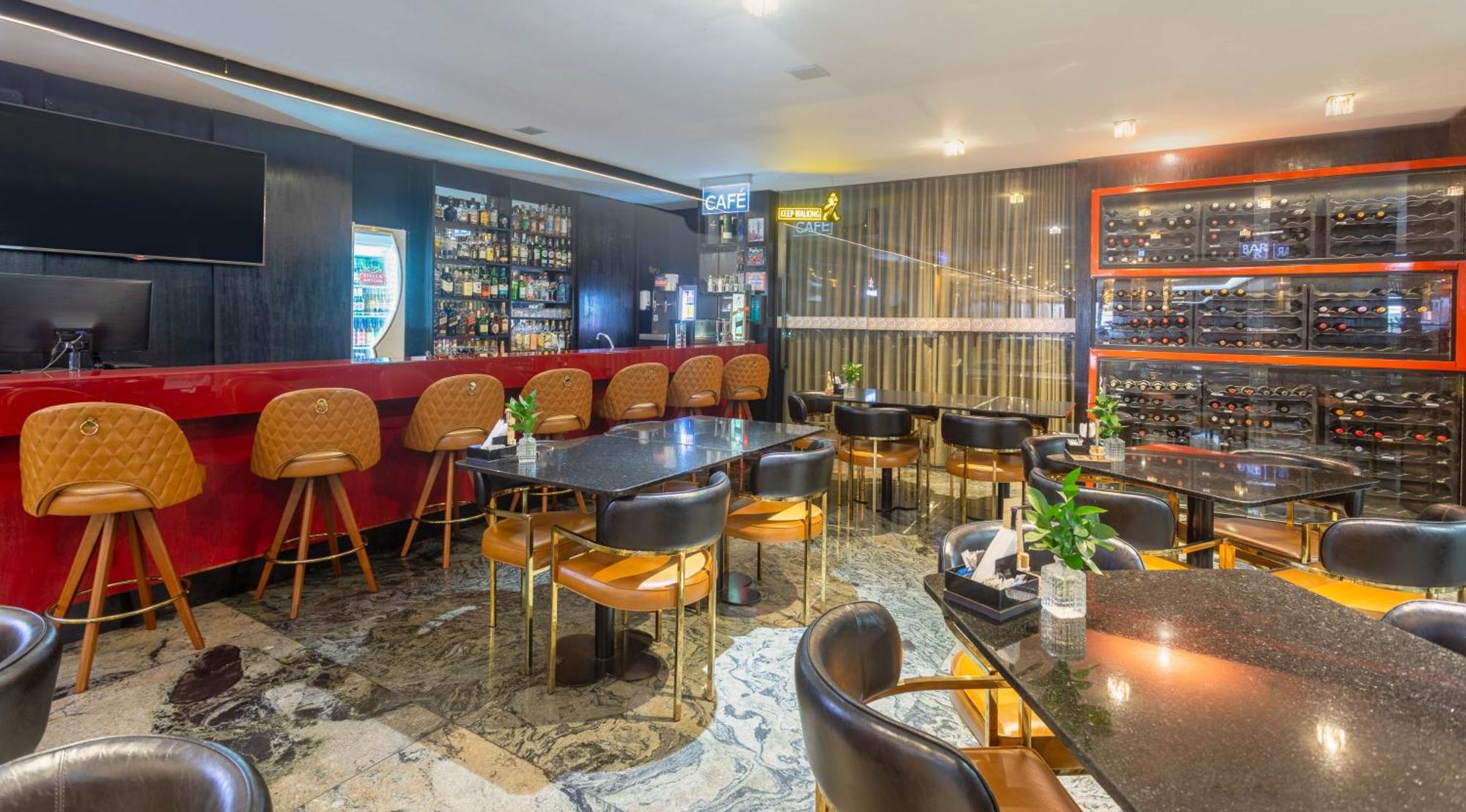 Ouro Minas Hotel Belo Horizonte, Dolce By Wyndham Exteriér fotografie The interior of the bar