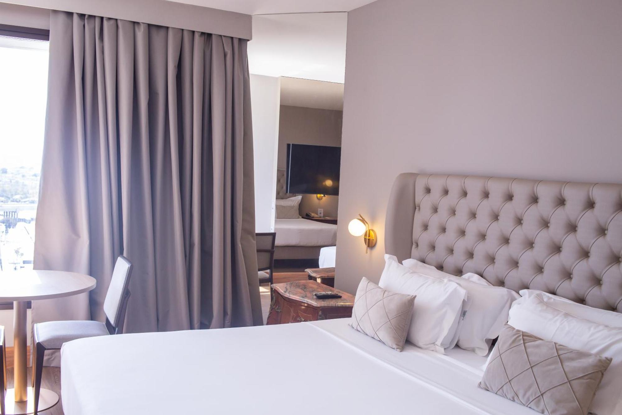 Ouro Minas Hotel Belo Horizonte, Dolce By Wyndham Exteriér fotografie A bedroom at the hotel